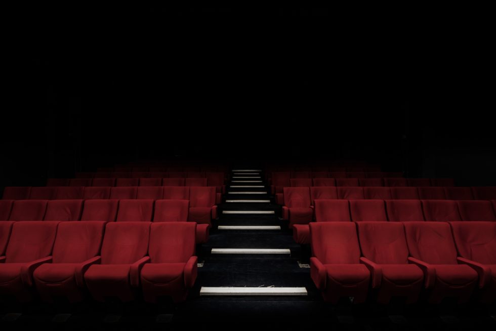 Rows of empty theater seats