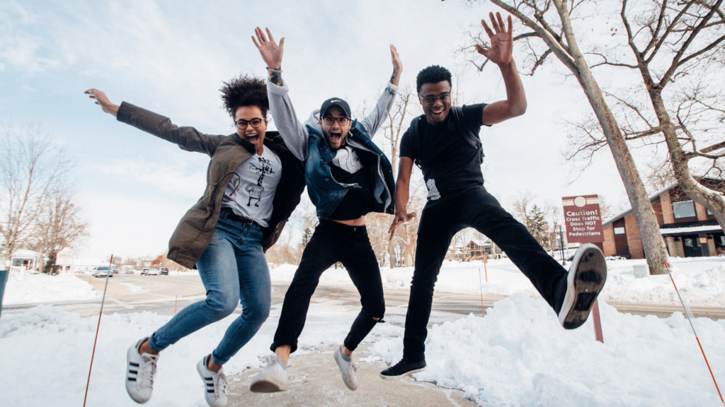 three people jumping