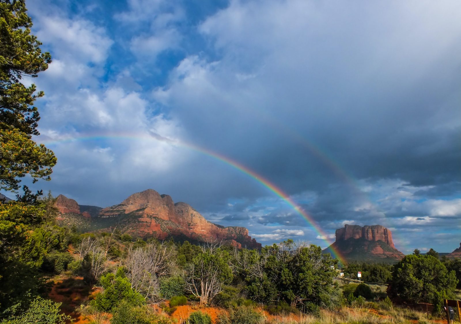 Rainbow over Arizona mountain range