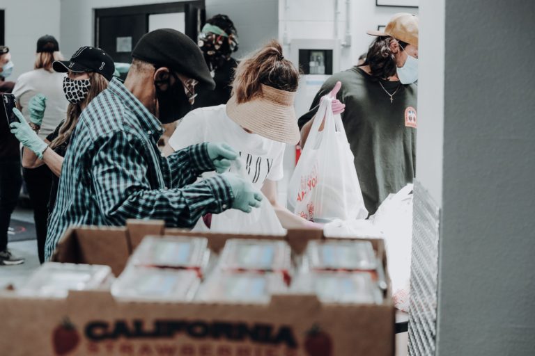 volunteers with gloves and masks