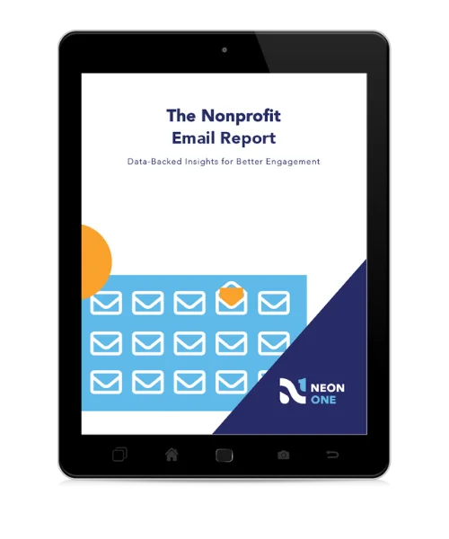 A tablet displays the cover page of The Nonprofit Email Report: Data-Backed Insights for Better Engagement