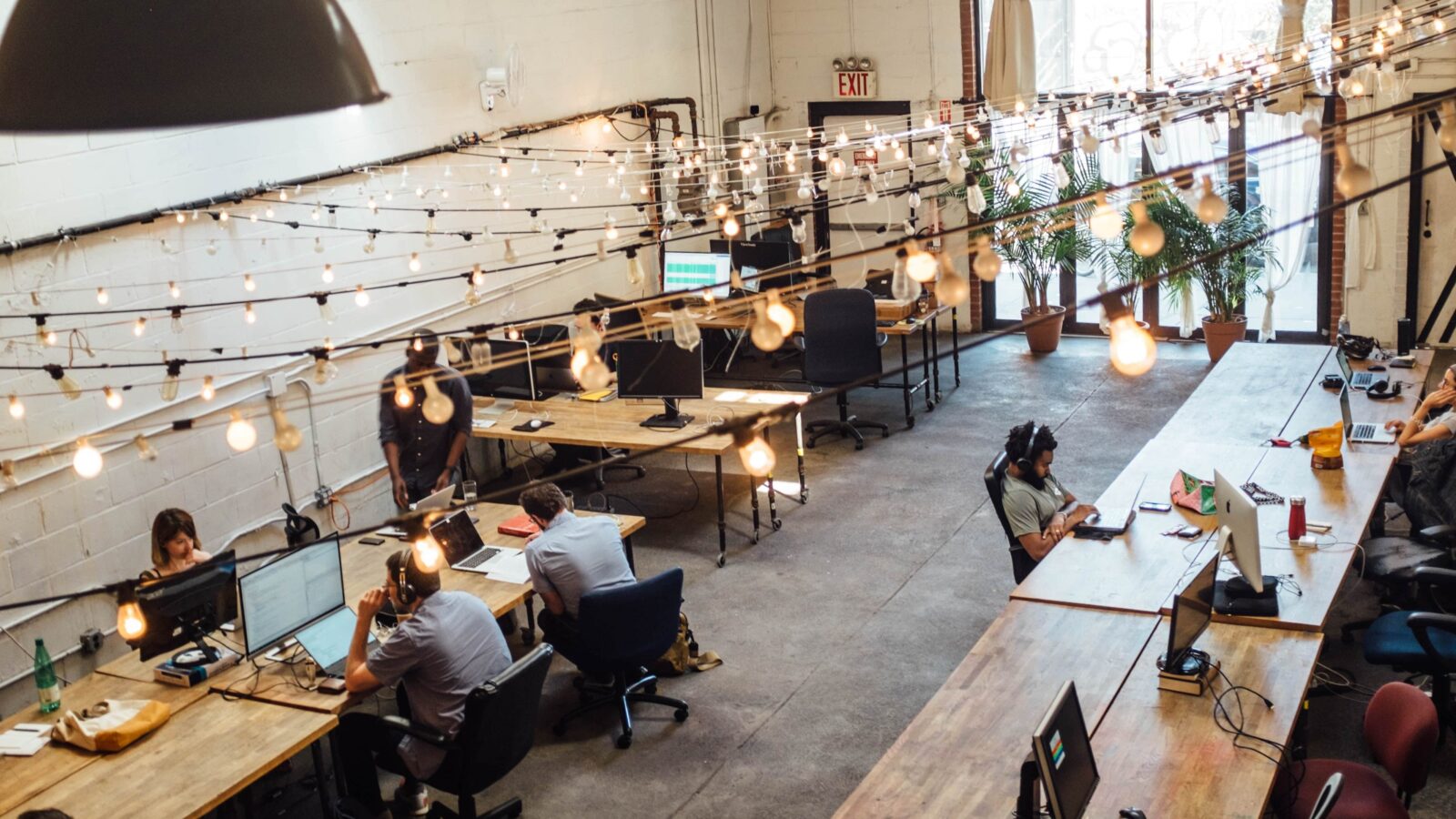 this photo shows a high-end co-working space, the type of place that a nonprofit could offer access to as a membership benefit.
