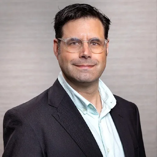 headshot of article author Michael Patti